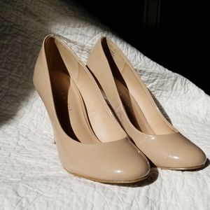 Nude patent heels